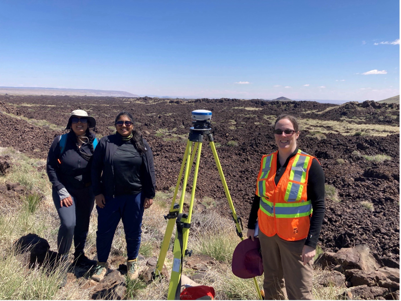 Image of planetary scientists in field 